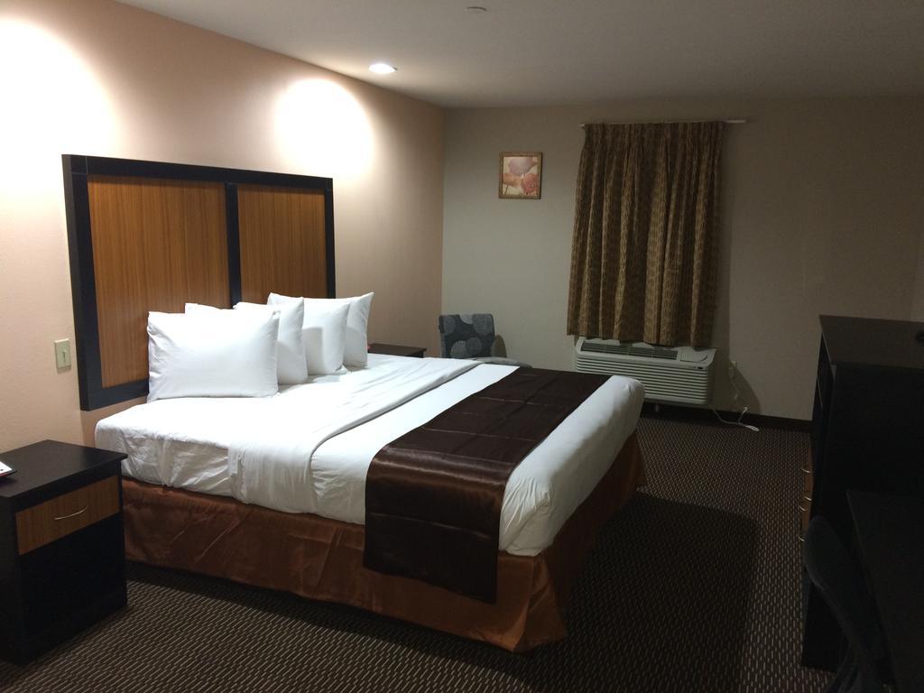 Paradise Inn & Suites Baton Rouge Værelse billede
